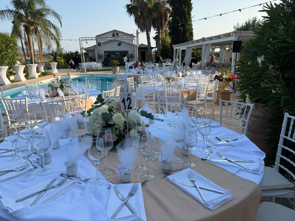 Garden table setup for a gathering at Villa Vravrona Tower